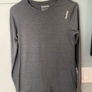 Slim fit Reebok fitness shirt. Size small.
